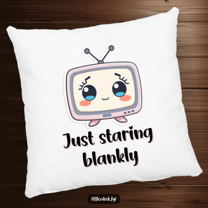 Funny pillow with a tiny monitor character exhibiting comically wide eyes, perfect for adding humor and comfort to any room.