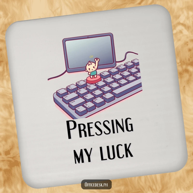 Funny coaster with a small character triumphantly pressing a tiny button on a large keyboard, adding motivational humor to surfaces.