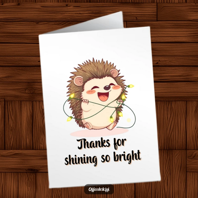Funny Free Printable Thank You Card: A happy hedgehog is playfully caught in a web of colourful fairy lights, a symbol of bright gratitude.